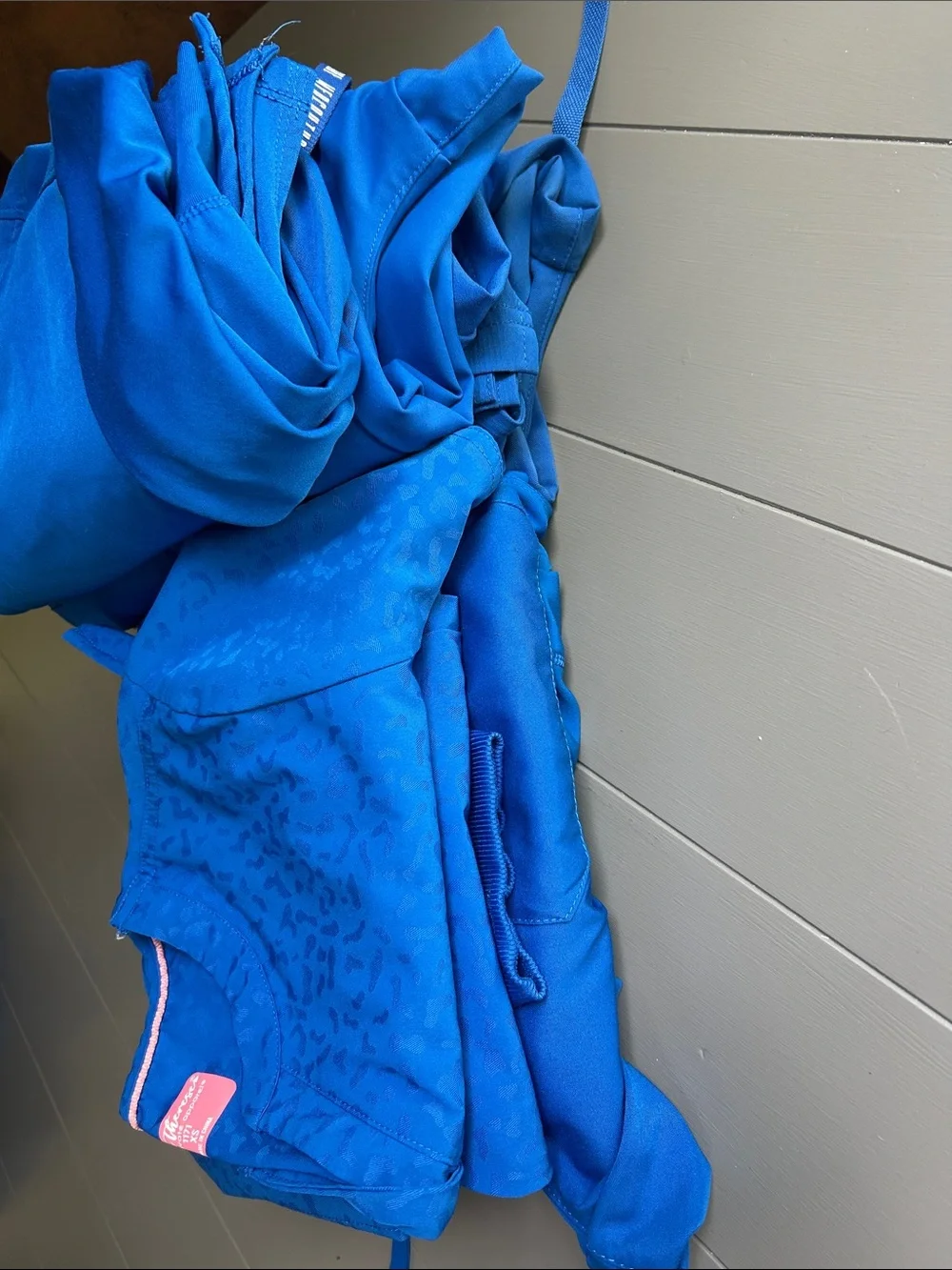 Bundle of royal blue nursing scrubs